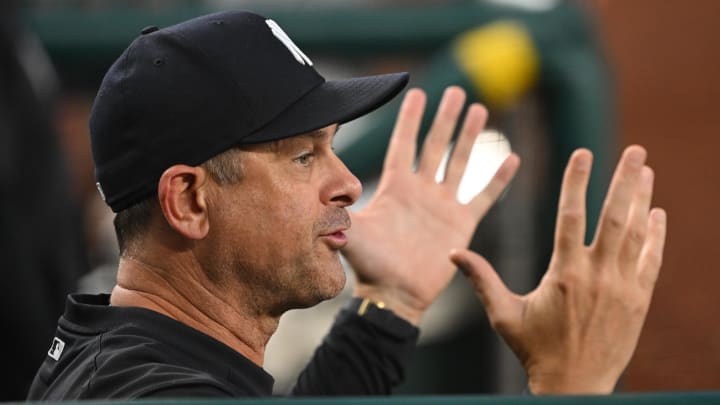 Aug 27, 2024; Washington, District of Columbia, USA; New York Yankees manager Aaron Boone gestures in the dugout.