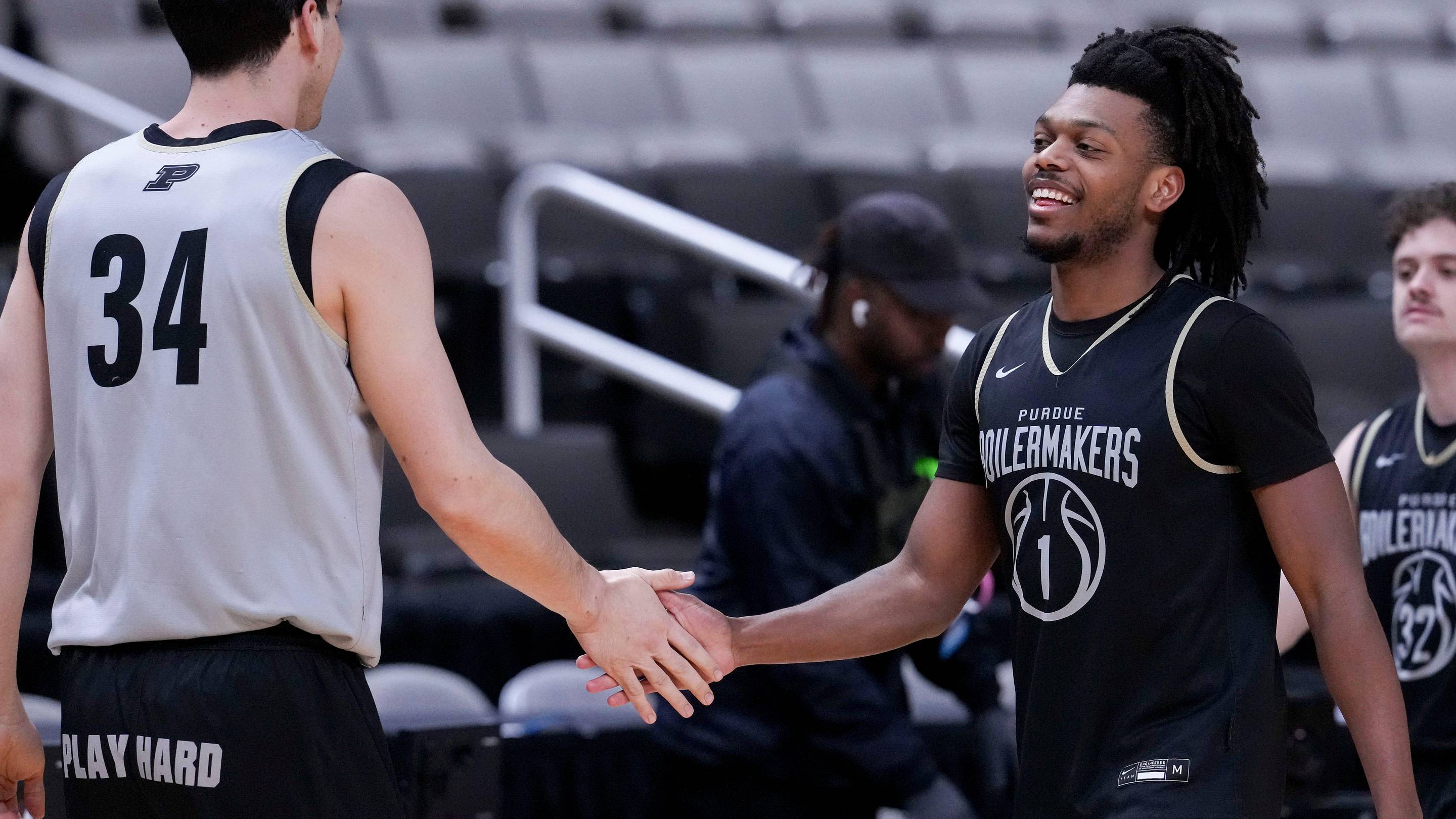 Purdue Boilermakers guard Antione West (1) high-fives forward Raleigh Burgess (34).