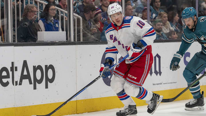 Jan 23, 2026; San Jose, California, USA;  New York Rangers left wing Artemi Panarin (10) looks to pass the puck during the third period against the San Jose Sharks at SAP Center at San Jose. Mandatory Credit: Stan Szeto-Imagn Images