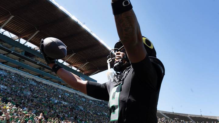 Oregon’s Jamari Johnson, center, celebrates a touchdown catch during the first quarter of the Oregon Spring Game at Autzen Stadium in Eugene April 25, 2026