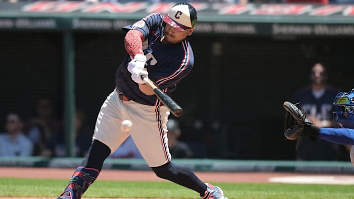 Jun 6, 2024; Cleveland, Ohio, USA; Cleveland Guardians first baseman Josh Naylor (22) hits an RBI ground out during the first inning against the Kansas City Royals at Progressive Field. Mandatory Credit: Ken Blaze-Imagn Images