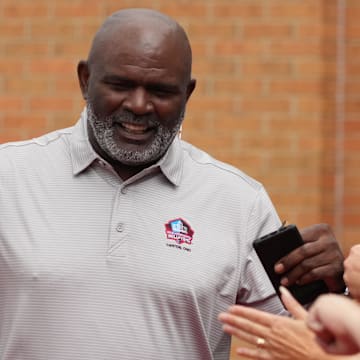 Lawrence Taylor arrives on the red carpet during the Pro Football Hall of Fame Class of 2022 Enshrinement.