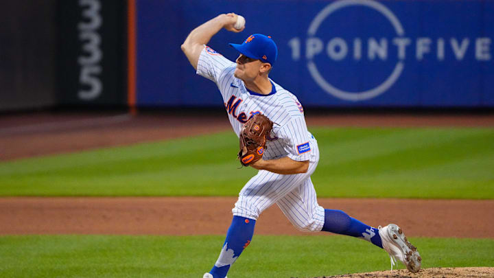 Jul 16, 2023; New York City, New York, USA; New York Mets pitcher David Robertson (30) delivers a pitch against the Los Angeles Dodgers during the ninth inning at Citi Field. Mandatory Credit: Gregory Fisher-Imagn Images