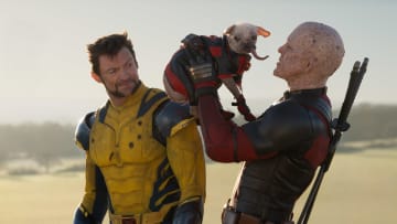 (L-R): Hugh Jackman as Wolverine/Logan, Dogpool, and Ryan Reynolds as Deadpool/Wade Wilson in 20th Century Studios/Marvel Studios' DEADPOOL & WOLVERINE. Photo by Jay Maidment. © 2024 20th Century Studios / © and ™ 2024 MARVEL.