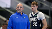 Nov 14, 2025; Dallas, Texas, USA; Dallas Mavericks head coach Jason Kidd and forward Cooper Flagg (32) look on during the second quarter against the LA Clippers in an NBA Cup game at the American Airlines Center. Mandatory Credit: Jerome Miron-Imagn Images