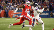 Buffalo Bills defensive end Greg Rousseau (50) chases New York Giants quarterback Tyrod Taylor (2) out of the pocket.