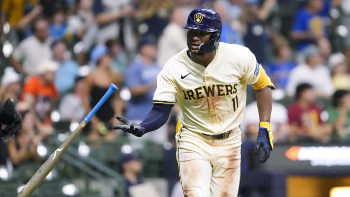 Aug 27, 2024; Milwaukee, Wisconsin, USA;  Milwaukee Brewers left fielder Jackson Chourio (11) tosses his bat after hitting a home run during the third inning against the San Francisco Giants at American Family Field. Mandatory Credit: Jeff Hanisch-USA TODAY Sports