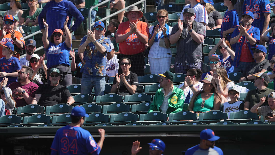 Apr 13, 2025; West Sacramento, California, USA; New York Mets fans cheer as pitcher Kodai Senga (34) walks to the dugout after the end of the seventh inning against the Athletics at Sutter Health Park. 