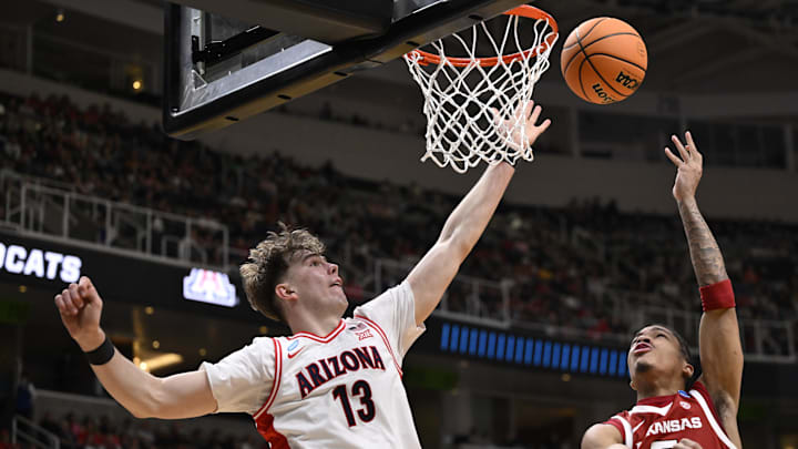 Mar 26, 2026; San Jose, CA, USA; Arkansas Razorbacks guard Darius Acuff Jr. (5) shoots the ball against Arizona Wildcats center Motiejus Krivas (13) in the second half during a Sweet Sixteen game of the West Regional of the men's 2026 NCAA Tournament at SAP Center. Mandatory Credit: Eakin Howard-Imagn Images