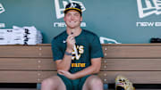 Jul 28, 2025; West Sacramento, California, USA; Athletics 2025 1st round draft pick Jamie Arnold speaks with members of the media before the game against the Seattle Mariners at Sutter Health Park. Mandatory Credit: Sergio Estrada-Imagn Images