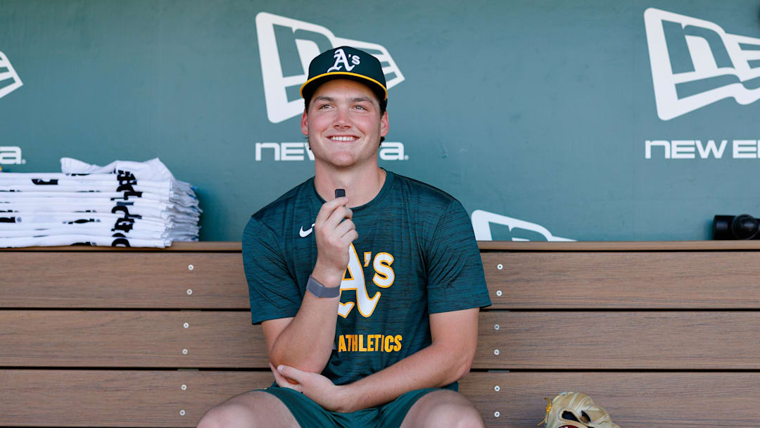 Jul 28, 2025; West Sacramento, California, USA; Athletics 2025 1st round draft pick Jamie Arnold speaks with members of the media before the game against the Seattle Mariners at Sutter Health Park. Mandatory Credit: Sergio Estrada-Imagn Images