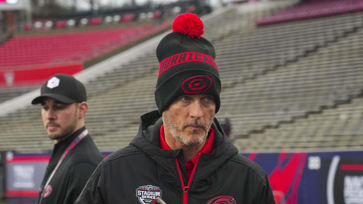 Feb 17, 2023; Raleigh, North Carolina, USA;  Carolina Hurricanes owner Tom Dundon looks on during practice at Carter-Finley Stadium. Mandatory Credit: James Guillory-Imagn Images