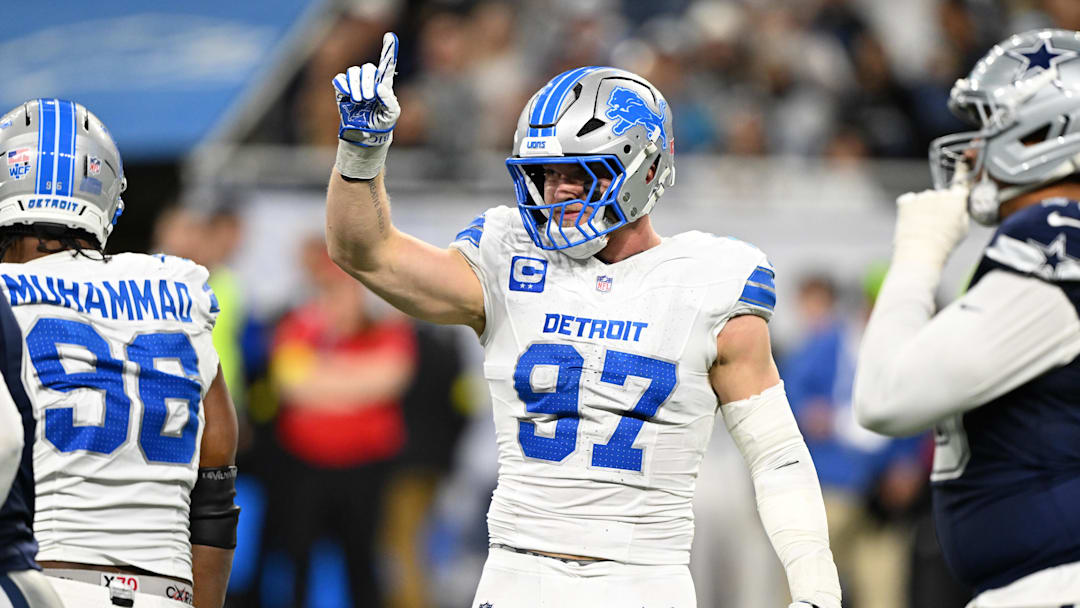Dec 4, 2025; Detroit, Michigan, USA; Detroit Lions defensive end Aidan Hutchinson (97) reacts after a play during the second half against the Dallas Cowboys at Ford Field. Mandatory Credit: Lon Horwedel-Imagn Images