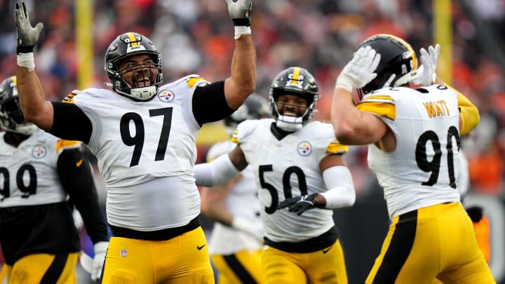 Nov 26, 2023; Cincinnati, Ohio, USA; Pittsburgh Steelers defensive tackle Cameron Heyward (97) and Pittsburgh Steelers linebacker T.J. Watt (90) celebrate a sack of Cincinnati Bengals quarterback Jake Browning (6) in the fourth quarter at Paycor Stadium. Mandatory Credit: Kareem Elgazzar-USA TODAY Sports