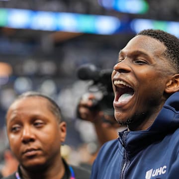 May 16, 2024; Minneapolis, Minnesota, USA; Minnesota Timberwolves guard Anthony Edwards (5) laughs after the game against the Denver Nuggets during game six of the second round for the 2024 NBA playoffs at Target Center. Mandatory Credit: Brad Rempel-Imagn Images