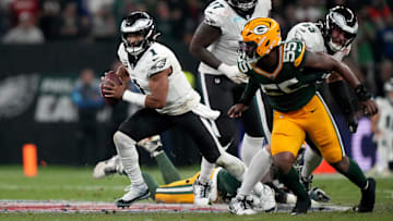 Jalen Hurts scrambles in the season opener from Brazil.