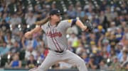 Jul 29, 2024; Milwaukee, Wisconsin, USA; Atlanta Braves starting pitcher Grant Holmes (66) delivers a pitch against the Milwaukee Brewers in the first inning at American Family Field. Mandatory Credit: Michael McLoone-USA TODAY Sports