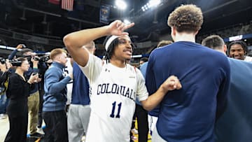 Mar 11, 2025; Indianapolis, IN, USA; Robert Morris Colonials guard DJ Smith (11) celebrates after defeating the Youngstown State Penguins to win the Horizon League Championship at Corteva Coliseum. Mandatory Credit: Robert Goddin-Imagn Images