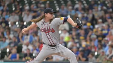 Jul 29, 2024; Milwaukee, Wisconsin, USA; Atlanta Braves starting pitcher Grant Holmes (66) delivers a pitch against the Milwaukee Brewers in the first inning at American Family Field. Mandatory Credit: Michael McLoone-USA TODAY Sports