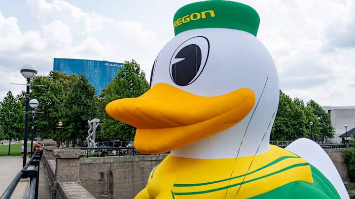 An inflatable of the University of Oregon Duck mascot floats on the White River in front of the NCAA Headquarters on Tuesday, July 23, 2024, in downtown Indianapolis. The float weighs in at 1,600 pounds and takes 1.5 hours to inflate.