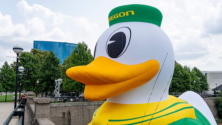 An inflatable of the University of Oregon Duck mascot floats on the White River in front of the NCAA Headquarters on Tuesday, July 23, 2024, in downtown Indianapolis. The float weighs in at 1,600 pounds and takes 1.5 hours to inflate. An inflatable of the University of Oregon Duck mascot floats on the White River in front of the NCAA Headquarters on Tuesday, July 23, 2024, in downtown Indianapolis. The float weighs in at 1,600 pounds and takes 1.5 hours to inflate.