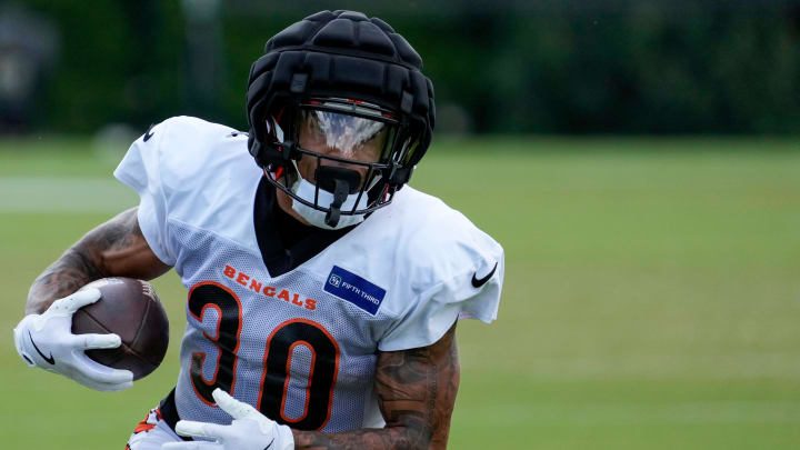 Cincinnati Bengals running back Chase Brown (30) runs with the ball during a preseason training camp practice at the Paycor Stadium practice field in downtown Cincinnati on Wednesday, Aug. 7, 2024.