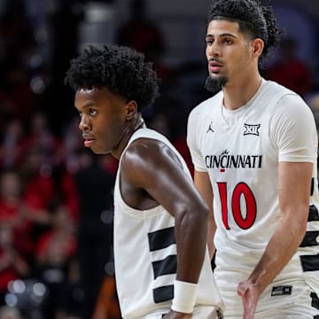 The Cincinnati Bearcats celebrate a win in the second half of the NCAA men’s basketball game between the Cincinnati Bearcats and the Western Carolina Catamounts at Fifth Third Arena in Cincinnati on Monday, Nov. 3, 2025. The Bearcats won 94-63.