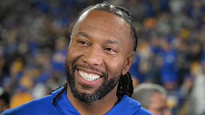 Oct 24, 2024; Pittsburgh, Pennsylvania, USA; Former Pittsburgh Panthers wide receiver Larry Fitzgerald reacts on the sideline against the Syracuse Orange during the second half at Acrisure Stadium. Mandatory Credit: Barry Reeger-Imagn Images Oct 24, 2024; Pittsburgh, Pennsylvania, USA; Former Pittsburgh Panthers wide receiver Larry Fitzgerald reacts on the sideline against the Syracuse Orange during the second half at Acrisure Stadium. Mandatory Credit: Barry Reeger-Imagn Images