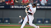 Oct 2, 2025; Cleveland, Ohio, USA; Cleveland Guardians outfielder Steven Kwan (38) hits a double in the eighth inning against the Detroit Tigers during game three of the Wildcard round for the 2025 MLB playoffs at Progressive Field. Mandatory Credit: Ken Blaze-Imagn Images