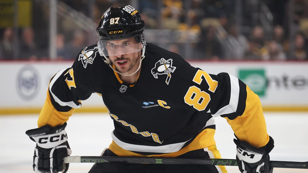 Apr 8, 2025; Pittsburgh, Pennsylvania, USA;  Pittsburgh Penguins center Sidney Crosby (87) looks on before a face-off against the Chicago Blackhawks during the first period at PPG Paints Arena. Mandatory Credit: Charles LeClaire-Imagn Images