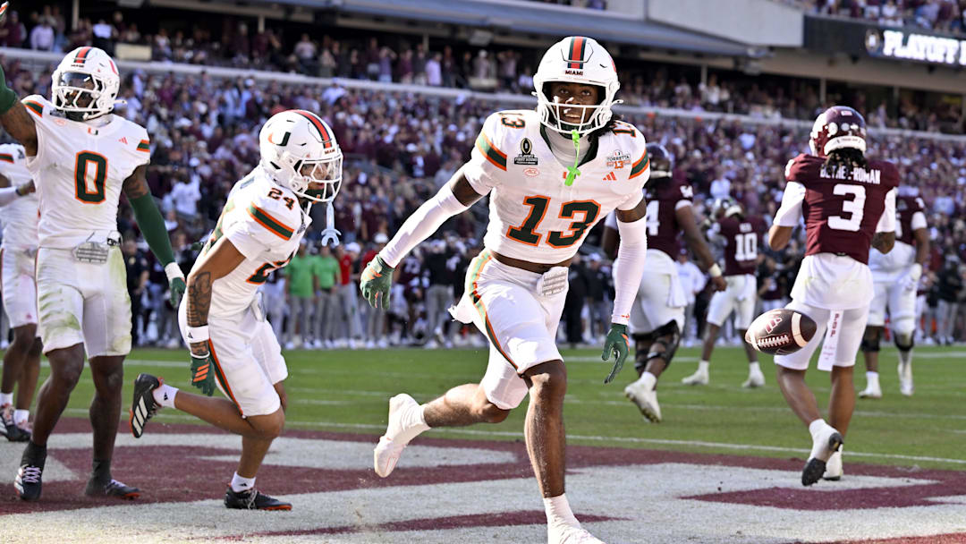 Dec 20, 2025; College Station, TX, USA;  Miami Hurricanes defensive back Bryce Fitzgerald (13) celebrates after he intercepts a Texas A&M Aggies pass to clinch the Miami win at Kyle Field. Mandatory Credit: Jerome Miron-Imagn Images