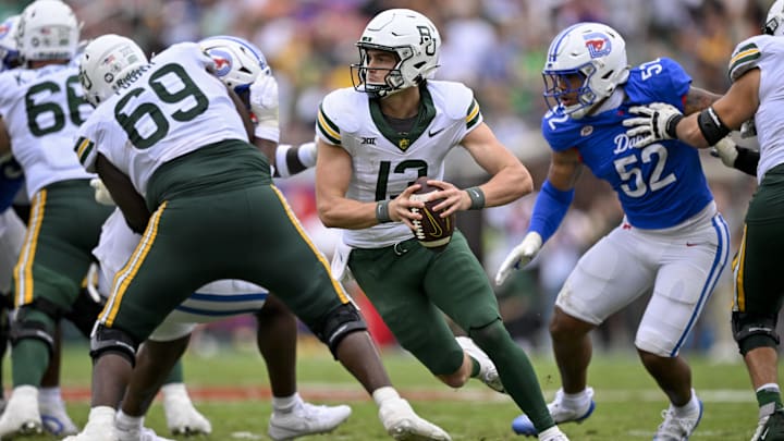 Sep 6, 2025; Dallas, Texas, USA; SMU Mustangs wide receiver Daylon Singleton (13) runs with the ball during the game between the SMU Mustangs and the Baylor Bears at Gerald J. Ford Stadium. Mandatory Credit: Jerome Miron-Imagn Images