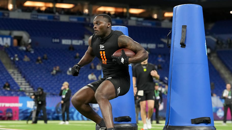 Jeremiyah Love does drills during the NFL scouting combine.