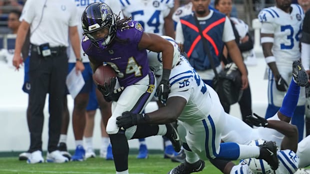 Baltimore Ravens running back Keaton Mitchell (34) runs for a gain during the first quarter against the Indianapolis Colts.