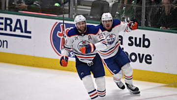 Edmonton Oilers center Leon Draisaitl (29) and right wing Kasperi Kapanen (42) react after a goal against the Dallas Stars 