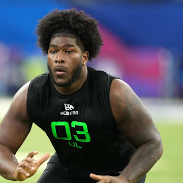 Mar 2, 2025; Indianapolis, IN, USA; Alabama offensive lineman Tyler Booker (OL03) during the 2025 NFL Combine at Lucas Oil Stadium. Mandatory Credit: Kirby Lee-Imagn Images