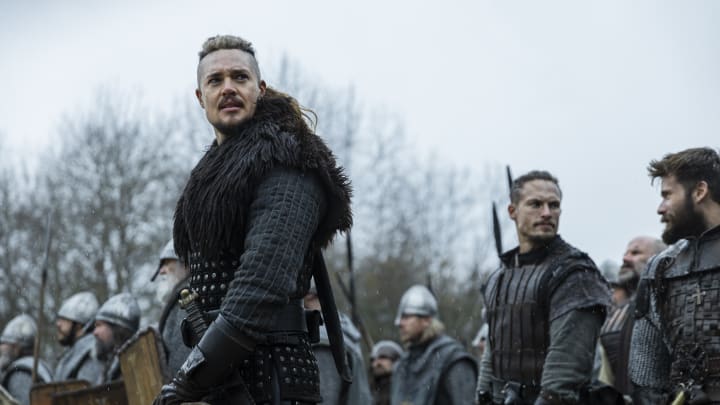 The Last Kingdom: Seven Kings Must Die. (L to R) Alexander Dreymon as Uhtred, Arnas Fedaravicius as Sihtric and Mark Rowley as Finan. Cr. Courtesy of Netflix © 2023