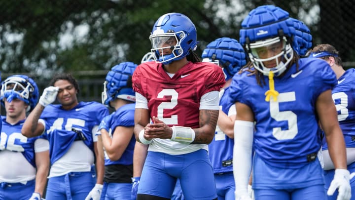 Kentucky quarterback Gavin Wimsatt watches from the sideline during practice Friday. August 2, 2024 in Lexington. Wimsatt is an Owensboro native who played at Rutgers last year before transferring to the Wildcats.