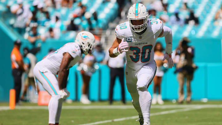 Sep 8, 2024; Miami Gardens, Florida, USA; Miami Dolphins fullback Alec Ingold (30) runs on the field against the Jacksonville Jaguars during the third quarter at Hard Rock Stadium.