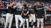 Aug 1, 2025; Miami, Florida, USA;  Miami Marlins center fielder Jakob Marsee (87), left fielder Kyle Stowers (28), third baseman Javier Sanoja (46), second baseman Xavier Edwards (9) and catcher Agustin Ramirez (50) celebrate after winning the game against the New York Yankees at loanDepot Park. Mandatory Credit: Sam Navarro-Imagn Images