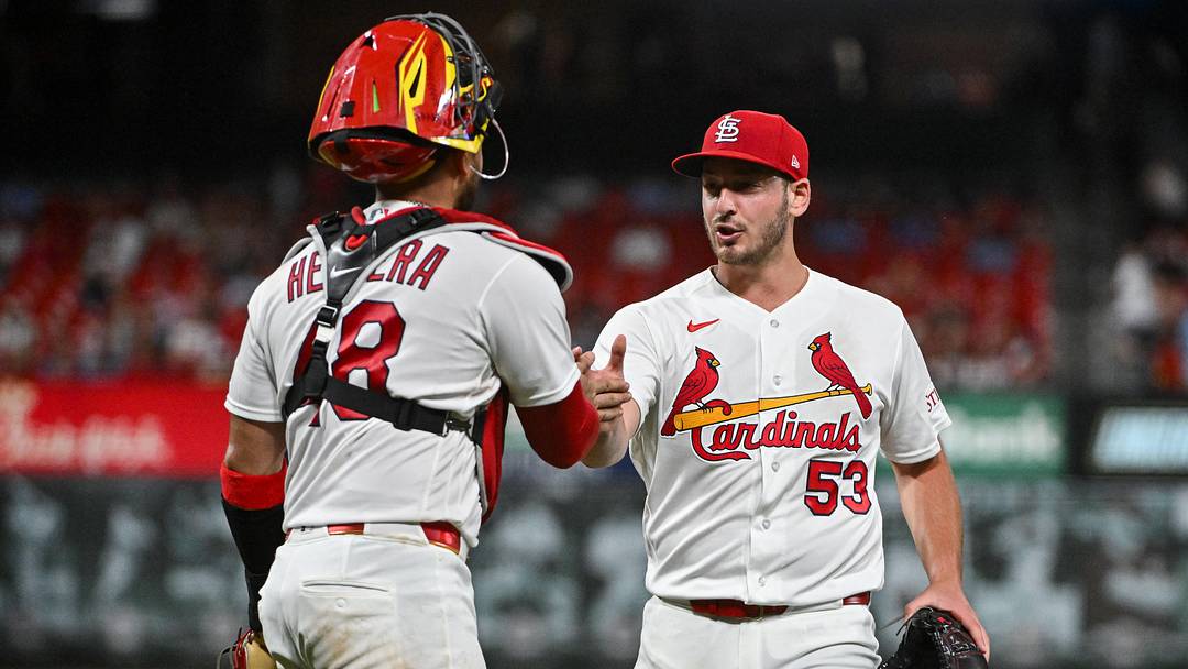 Jun 16, 2026; St. Louis, Missouri, USA; St. Louis Cardinals starting pitcher Andre Pallante (53) celebrates with catcher Ivan Herrera (48) as they walk off the field after the seventh inning at Busch Stadium. Mandatory Credit: Jeff Curry-Imagn Images