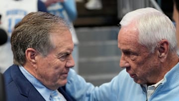 Jan 18, 2025; Chapel Hill, North Carolina, USA; North Carolina Tar Heels head football coach Bill Belichick with former Tar Heels basketball coach Roy Williams before the game at Dean E. Smith Center. Mandatory Credit: Bob Donnan-Imagn Images