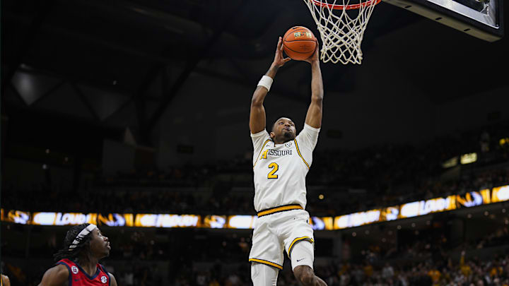 Missouri Tigers guard Tamar Bates (2) dunks the ball in a game versus the Ole Miss Rebels this season.