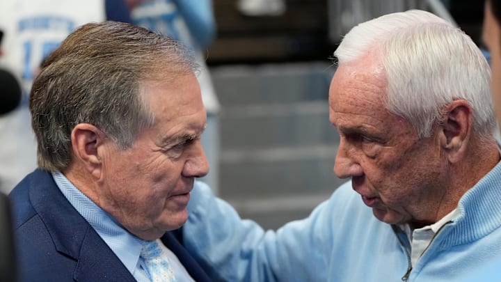 North Carolina Tar Heels head football coach Belichick with former basketball coach Williams before the game at Dean E. Smith Center. 