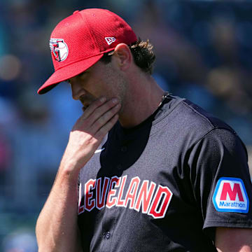 Mar 2, 2024; Goodyear, Arizona, USA; Cleveland Guardians starting pitcher Shane Bieber (57) leaves the game against the Kansas City Royals during the second inning at Goodyear Ballpark. Mandatory Credit: Joe Camporeale-Imagn Images