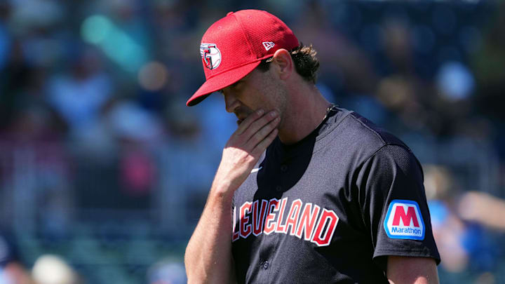 Mar 2, 2024; Goodyear, Arizona, USA; Cleveland Guardians starting pitcher Shane Bieber (57) leaves the game against the Kansas City Royals during the second inning at Goodyear Ballpark. Mandatory Credit: Joe Camporeale-Imagn Images