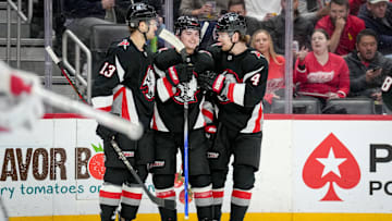 Buffalo Sabres players Josh Norris, Zach Benson and Bowen Byram
