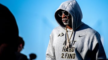 CU football head coach Deion Sanders, or Coach Prime, watches his team warm up before the game against CSU in the Rocky Mountain Showdown at Canvas Stadium on Saturday, Sept. 14, 2024, in Fort Collins, Colo.