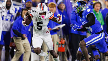 Oct 26, 2024; Lexington, Kentucky, USA; Auburn Tigers wide receiver KeAndre Lambert-Smith (5) runs the ball during the third quarter against the Kentucky Wildcats at Kroger Field. Mandatory Credit: Jordan Prather-Imagn Images