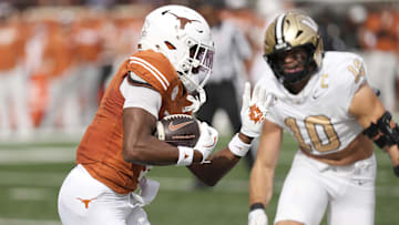 Nov 1, 2025; Austin, Texas, USA; Texas Longhorns wide receiver Ryan Wingo (1) runs for a 75-yard touchdown after catching a pass on the first play of the game against the Vanderbilt Commodores.
